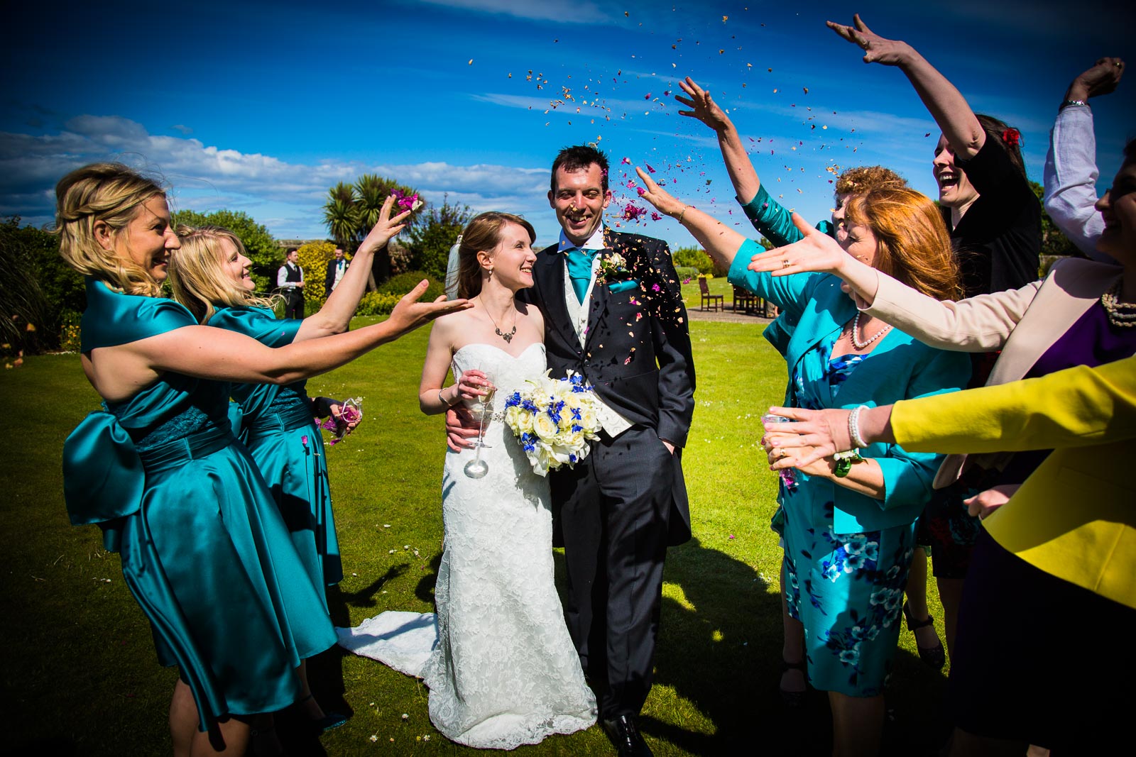 Throwing Confetti at Marine Hotel Wedding